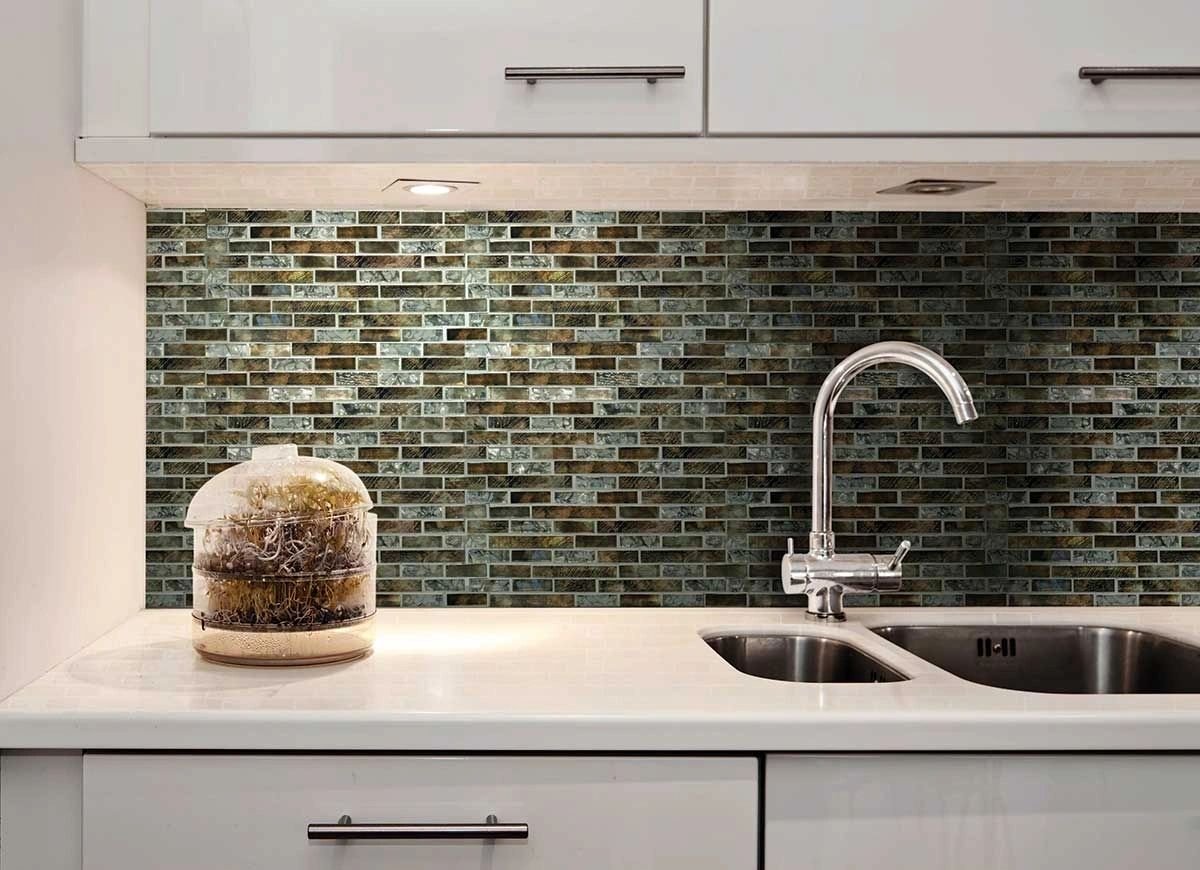 Mosaic backsplash and white kitchen cabinets