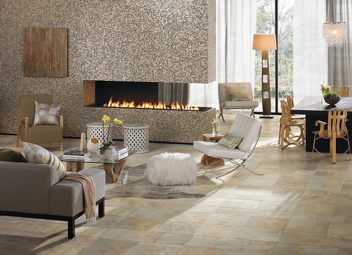 Textured fireplace wall and stone flooring